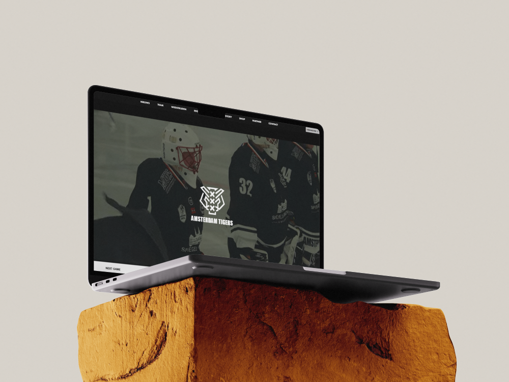 Website van ijshockeyclub Amsterdam Tigers weergegeven op een laptop